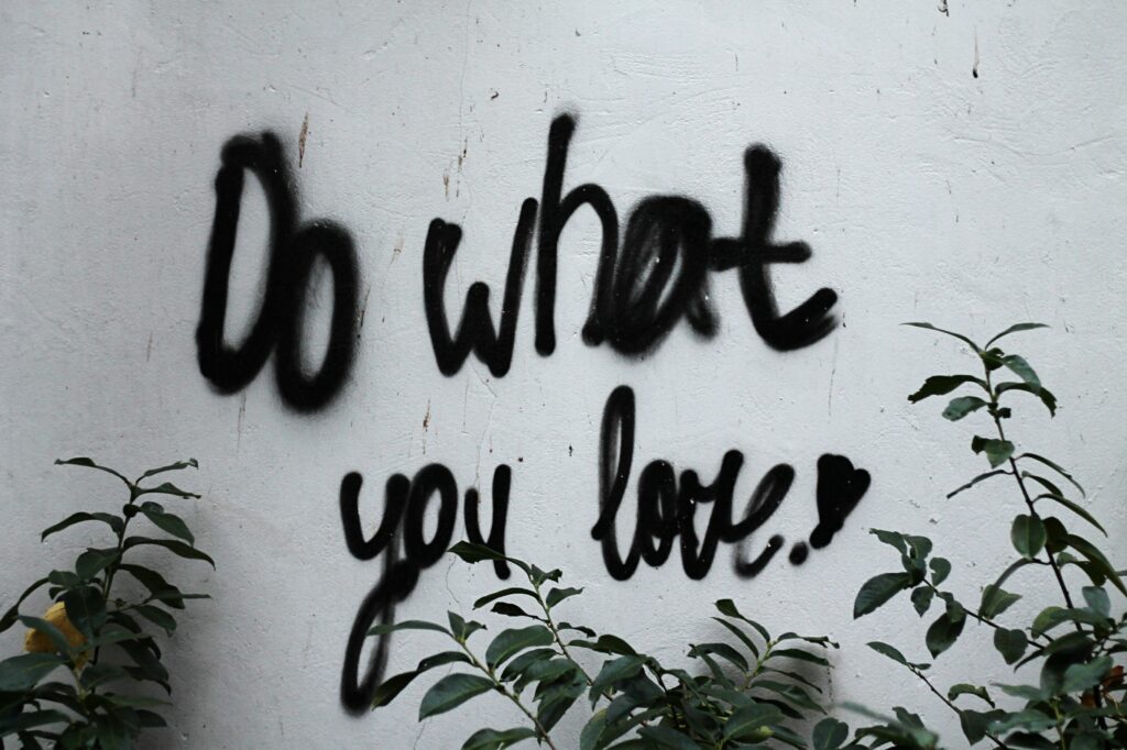 Do what you love written on a wall